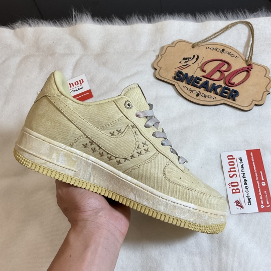 NIKE AIR FORCE 1 LOW NAI-KE TAN CANVAS