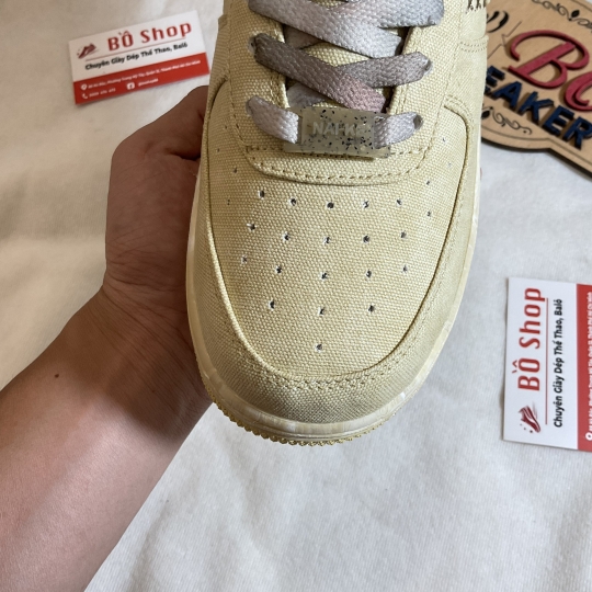 NIKE AIR FORCE 1 LOW NAI-KE TAN CANVAS
